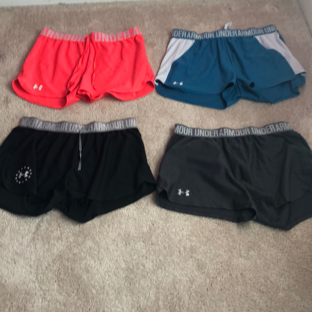 Under armor shorts four pair women’s large